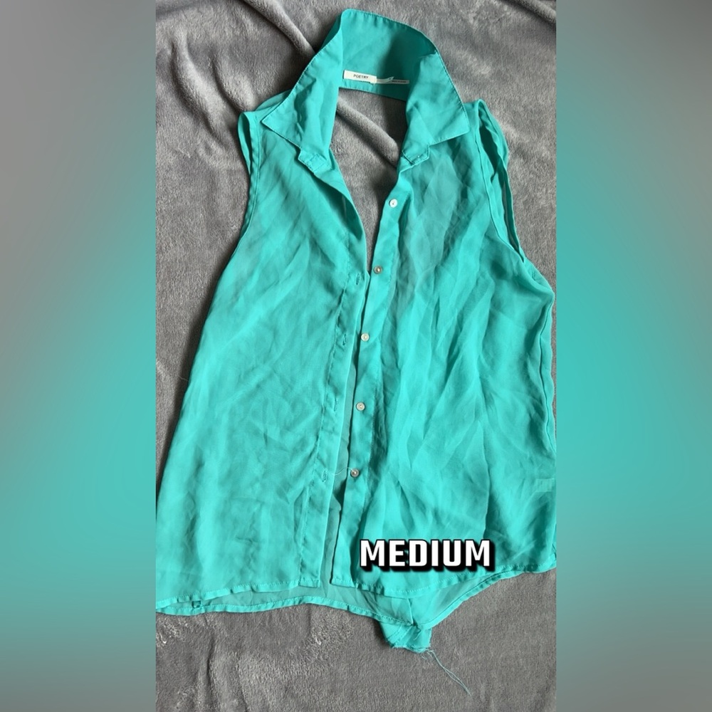 Poetry date night out tank top. Vibrant teal color. Shows off back. Sheer.
